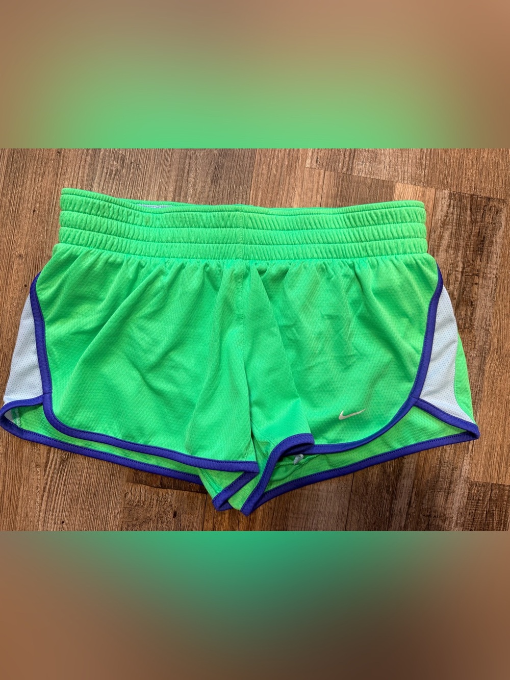 Nike Women’s Bright Green Athletic Shorts with Purple Trim